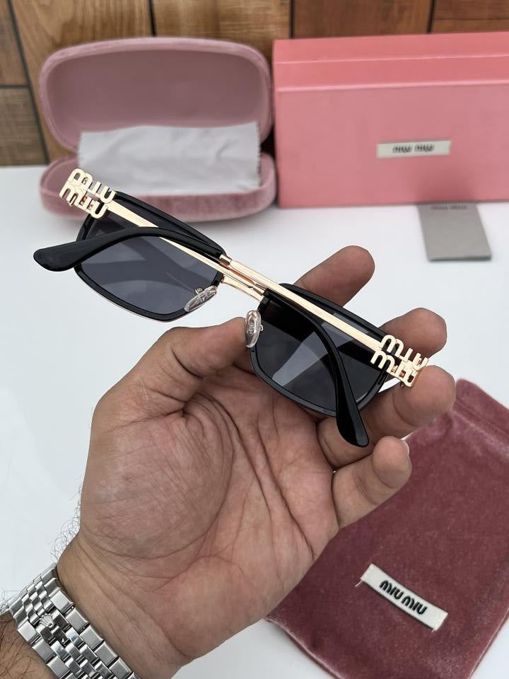 Miu_Miu 559 Gold Black